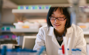 asian woman in lab