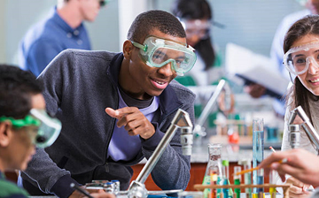 three undergraduates in a lab