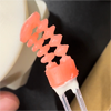 A photo of a pneumatically operated, rubber robotic catheter tip.