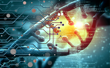 A blue illustration of DNA with a yellow glow behind it and an image of circuitry overlaid