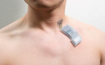 A wireless ultrasound patch placed on the neck