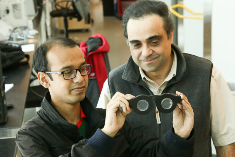 Mastrangelo, right, and doctoral student Nazmul Hasan holding smart glasses Mastrangelo, right, and doctoral student Nazmul Hasan holding smart glasses