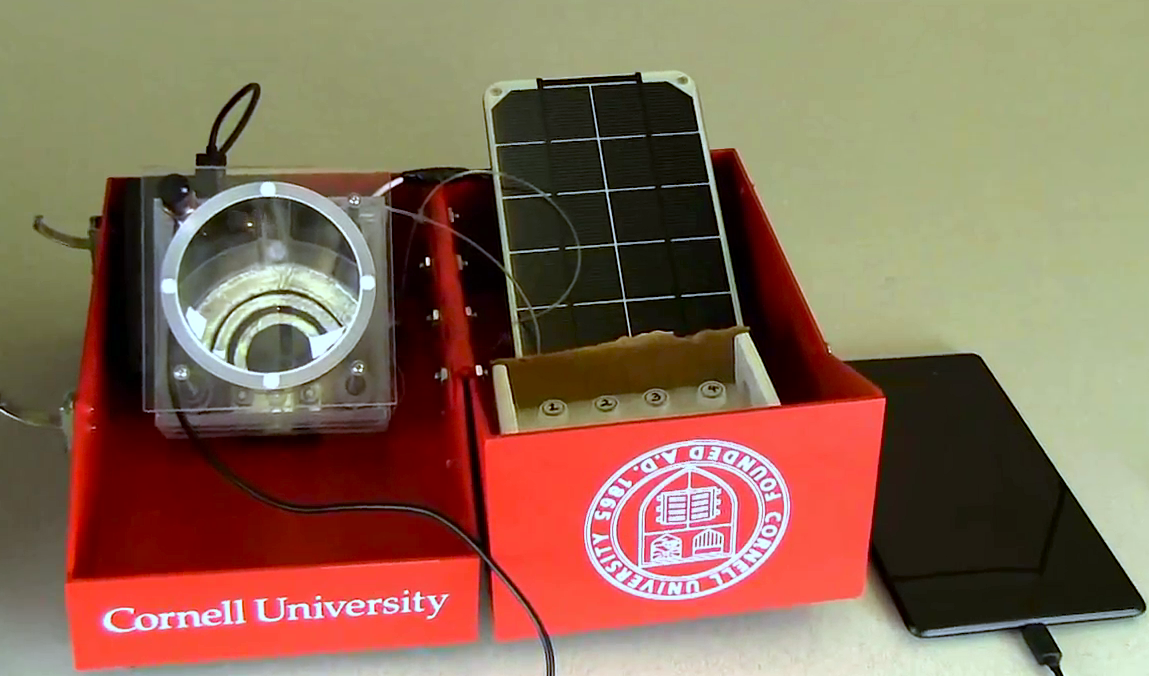 An image of the device. A large lens, solar panal and tablet.