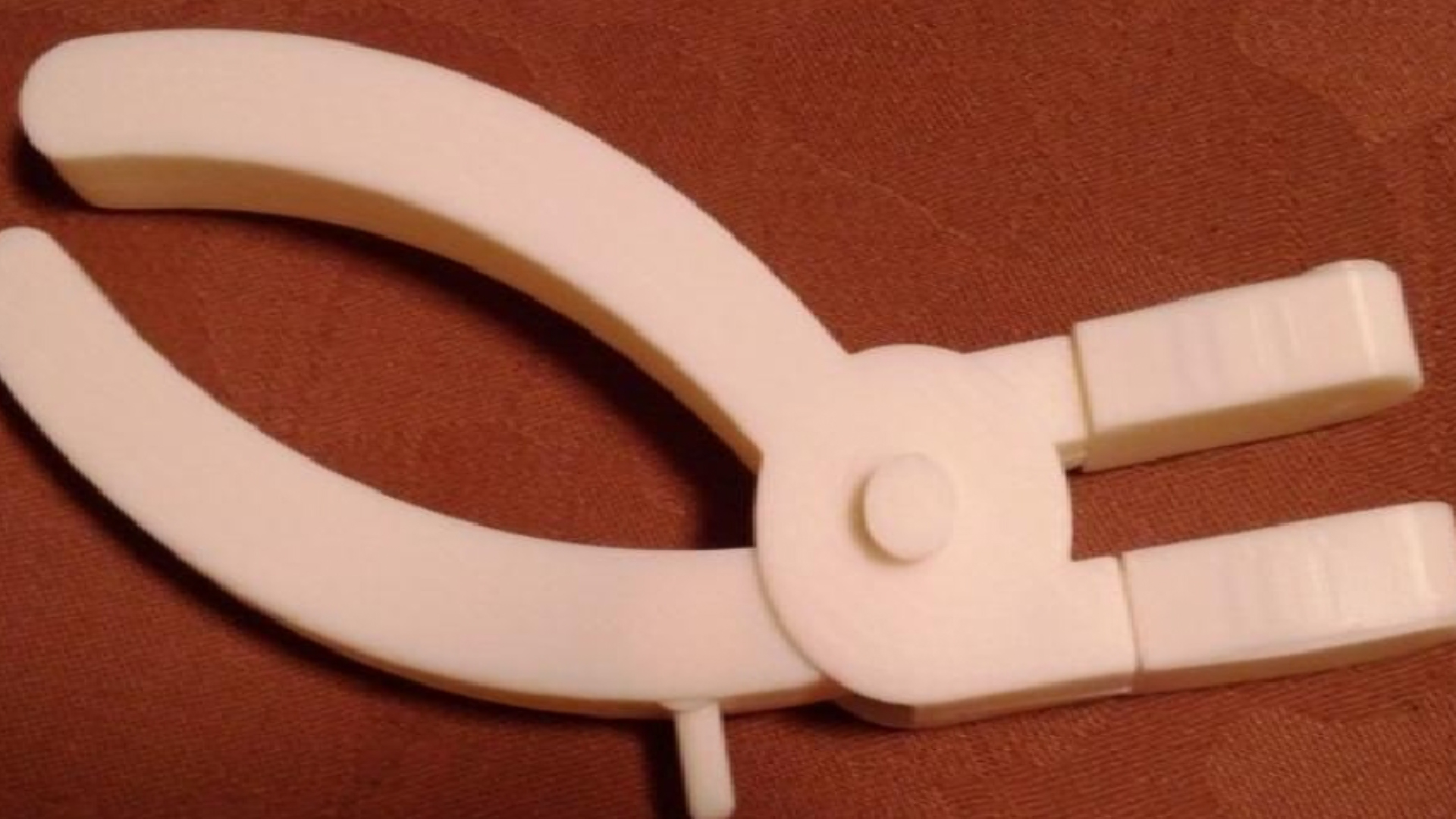 Photo of QuickStitch device