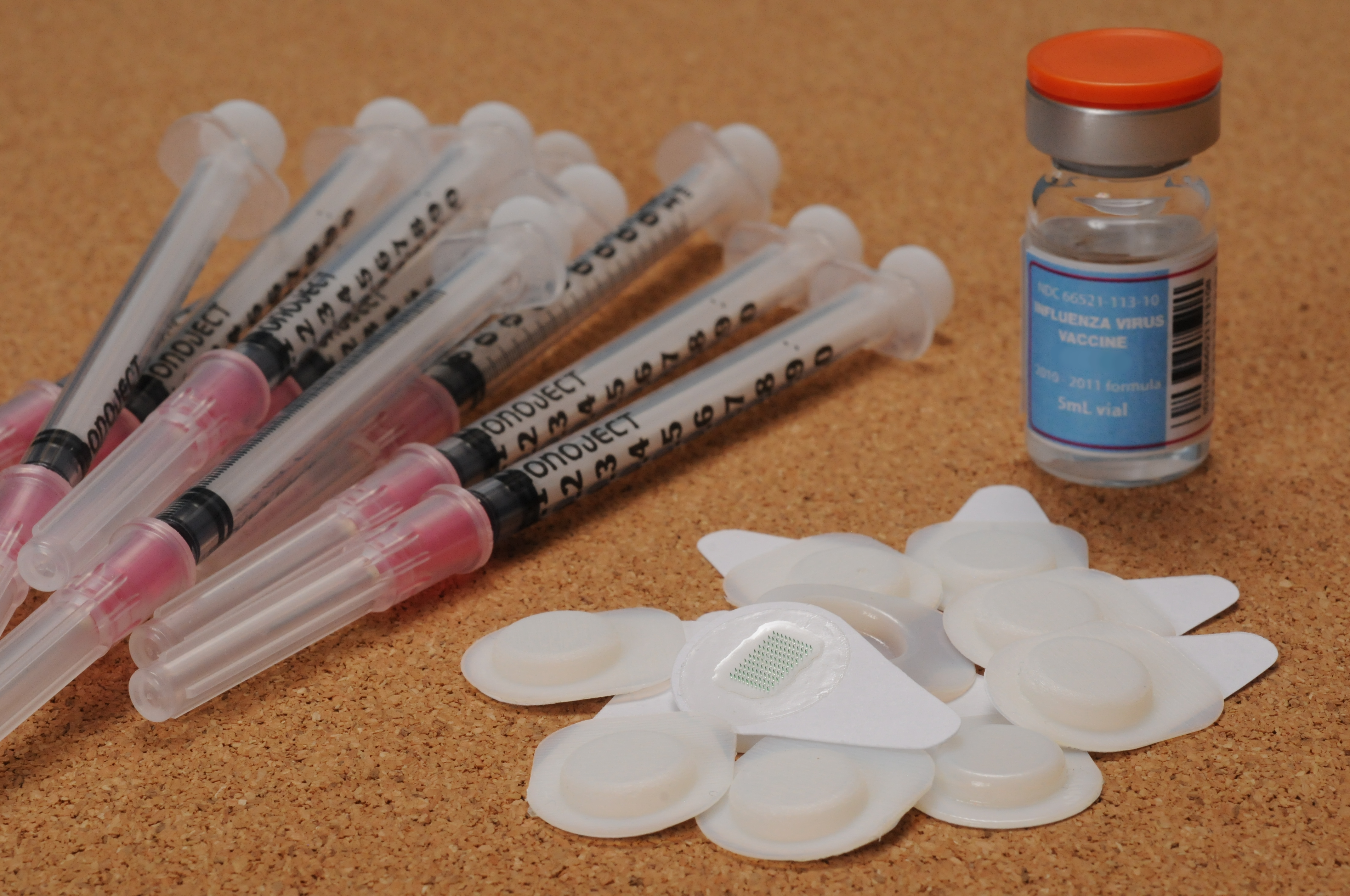 microneedle patches and conventional flu vaccine supplies