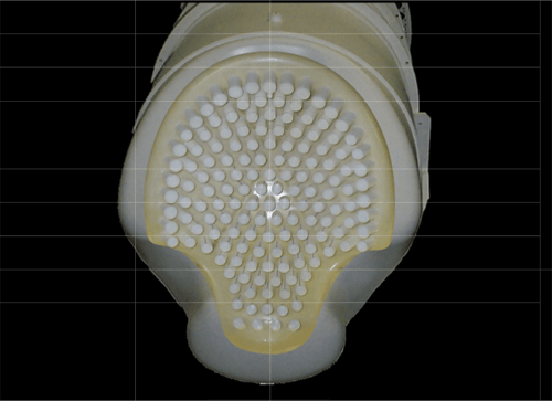 A head-on view of the SARA device’s 151 biomagnetic sensors