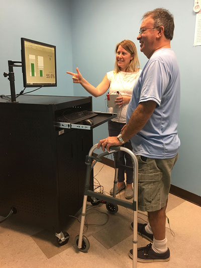 Spinal cord injured individual training with sacral nerve stimulation