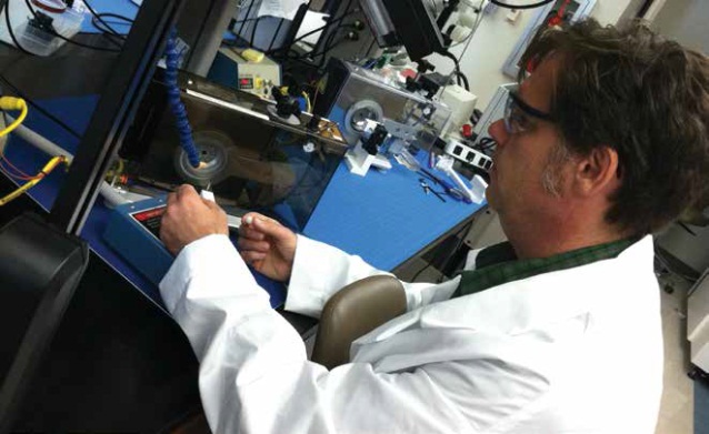 Dr. Maitland working in the laboratory