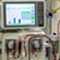 Hemodialysis equipment used in the clinic (A) contains the same filters as the simplified ex vivo model (B) Lambris used to assess complement activation and inhibition under laboratory conditions. (C) Circulating blood through the filters for 2 hours increases complement activation components (red, control), but adding the complement inhibitor compstatin decreases complement activation. Hemodialysis equipment used in the clinic (A) contains the same filters as the simplified ex vivo model (B) Lambris used to assess complement activation and inhibition under laboratory conditions. (C) Circulating blood through the filters for 2 hours increases complement activation components (red, control), but adding the complement inhibitor compstatin decreases complement activation.