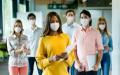 group of diverse students wearing masks