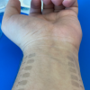 bioimpedance graphene tattoos applied on the underside of the wrist