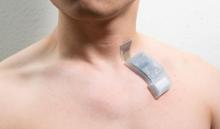 A wireless ultrasound patch placed on the neck