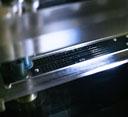 This is an image of a micralyne double T chip staged on a Micralyne microchip capillary electrophoresis unit