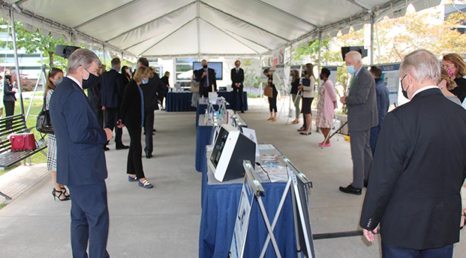 Senators and their staff view an array of 32 COVID-19 testing technologies developed with support from the RADx Tech/ATP program at NIH. (NIBIB photo)