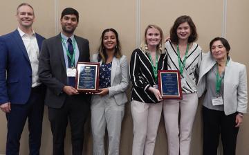 Georgia Tech students Bailey Klee and Rachel Mann (second and third from right), part of the team that won the HIV Prize are joined (L-R) by  James Rains, Pranav Dorbala, and Madhumita Baskaran (2nd place winners from Georgia Tech) and Zeynep Erim, Director, NIBIB Training Program (far right).