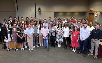 A group photo from the event, including congressional staff, AIMBE leadership, NIBIB-supported demonstrators, and NIBIB leadership.