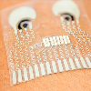 epidermal patch attached to forearm to monitor blood pressure and metabolites