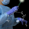Surgeon holding a probe that is emitting light. Underneath, a chemical compound that is linked to text that reads p28.