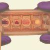 Interconnected tissue chip system, held between two gloved hands